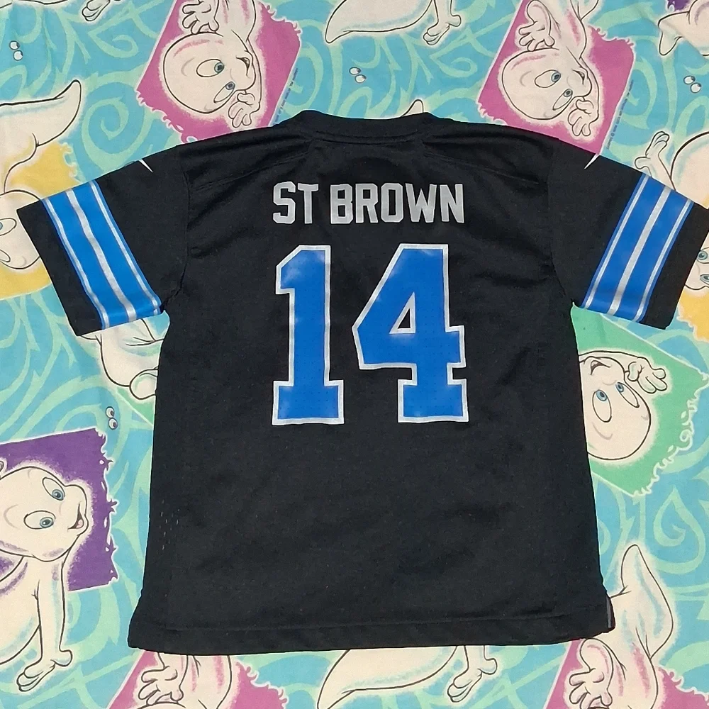 Nike Amon Ra St Brown Detroit Lions Blaxk Football Jersey NFL Shirt